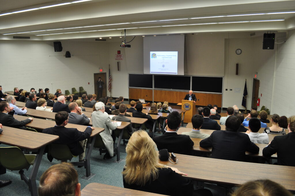 Dr. Simons captivates the audience with his Zeien Lecture on "Mathematics, Common Sense, and Good Luck."